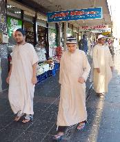 Muslims walk on Sydney street after shooting incident