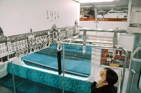 Train with pictures of Tokyo Station's 100 years to run