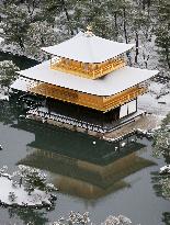 Kinkakuji Temple covered with snow 1st time this season