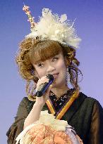 Osaka pop ballad diva sings during show