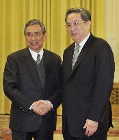 Ex-Japanese lawmaker meets China's 4th-ranked politician