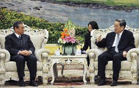 Ex-Japanese lawmaker meets China's 4th-ranked politician