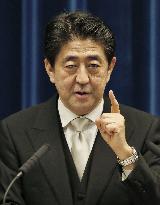 Abe launches new Cabinet