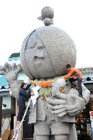 Comic character effigy gets New Year sacred rope