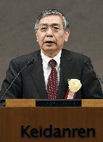 BOJ chief urges business executives to raise wages