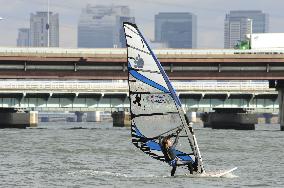 Windsurfers taking to Yodo River in downtown Osaka