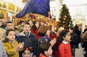 Syrian children pray for peace on Christmas eve