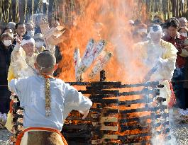 Old charms burned in ceremony at Buddhist temple