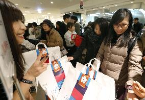 Foreigners buy lucky bags at Japanese department store