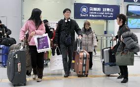 Returning New Year's travelers reach peak