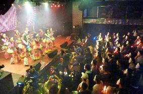 Masked girls perform in Akihabara theater for geeks