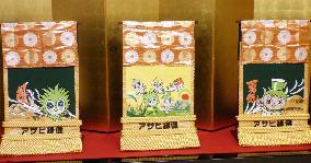 Trio of ornamental aprons presented to yokozuna Hakuho
