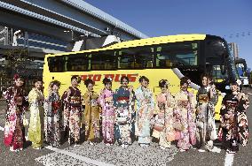 Coming-of-age ceremony for bus tour guides