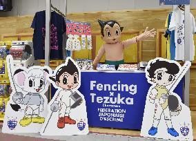Cartoonist Tezuka's characters used to promote fencing