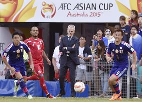 Japan coach Aguirre watches Asian Cup game vs. Palestine