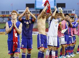 Japan players acknowledge fans' cheers after win