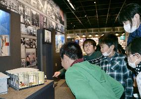 Kids from disaster-hit region visit 1995 quake memorial in Kobe