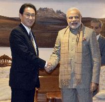 Japanese Foreign Minister Kishida talks with Indian PM Modi