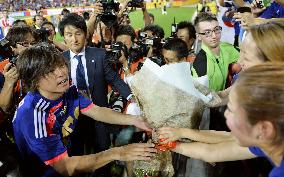 Japan MF Endo gets bouquet for 150th national team cap