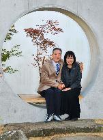 Kumamoto park creates moon-shaped loveseat bench for couples