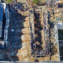 People gather to see ditch of ancient tomb in Nara