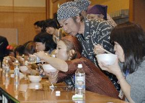 Contestants gulp 'natto' beans at speed-eating competition