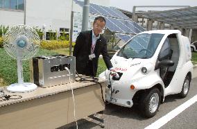 Denso unveils system using electric vehicles as part of power grid