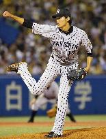 Fujinami finds his groove, pitches Tigers past Swallows