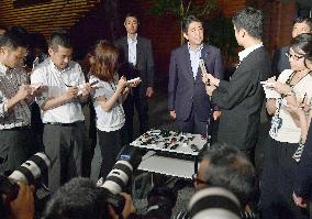 Abe meets with reporters over hostage crisis