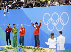Olympics: Medal ceremony for men's 100-meter butterfly