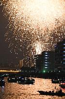 Sumida River Fireworks Festival lights up rainy Tokyo night