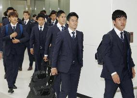 Football: Japan squad returns from World Cup