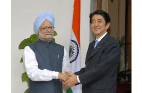 Japanese Prime Minister Abe talks with Indian counterpart Singh
