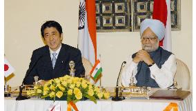 Abe, Singh adopt road map for ties, differ on climate, nukes