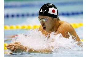 Olympic champ Kitajima powers to breaststroke double