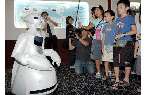 Toyota unveils tour-guide robot at exhibition hall