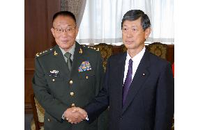 Japan, China hold defense minister talks in Tokyo