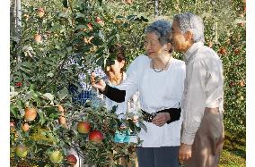 Emperor, empress visit apple farm