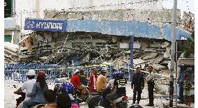 Collapsed car showroom in Sumatra devastated by M8.4 earthquake