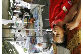 Patients treated in outdoor tent in quake-stricken Sumatra