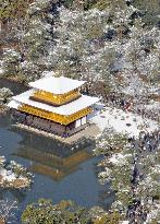 Aerial photo of snow-capped Golden Pavilion