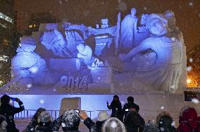 Sochi Olympics snow sculpture lit up in Sapporo