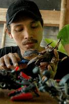INDONESIA-BOGOR-INSECT ROBOT TOYS-RECYCLED MATERIALS