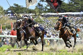 Armored warriors compete in horse race
