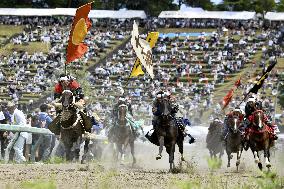 Armored warriors compete in horse race