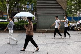 CHINA-SHANGHAI-VISUALLY IMPAIRED BROTHERS-COFFEE SHOP (CN)