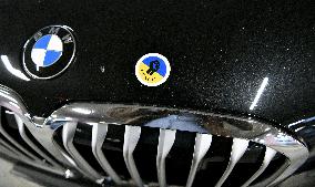 Ukraine stickers on Russian cars