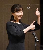 Princess Kako communicates in sign language