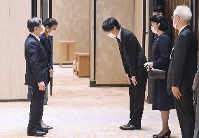 Japan imperial couple return from Queen Elizabeth's funeral