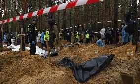 Mass burial site in eastern Ukraine